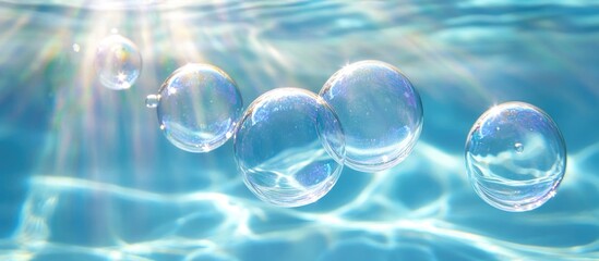 Poster - Water Bubbles Rising to Surface with Sunlight Reflections on Clear Blue Aquatic Background