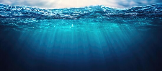 Poster - Serene Deep Blue Ocean Surface with Clear Water and Soft Light Rays Ideal for Text Overlay or Inspirational Quotes