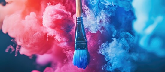 Poster - Close up of a paintbrush with vibrant colorful smoke background ideal for creative projects and artistic expressions with text space.