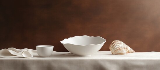 Aufkleber - Elegant Still Life of White Ceramic Bowl and Seashell on Neutral Brown Background