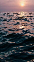 Aufkleber - A surreal landscape with flowing, silky waves reflecting warm sunset light.