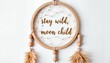 © Rafail - Bohemian dreamcatcher with 'Stay Wild, Moon Child' design, inspiration