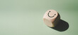 © LAONG - Wood cube with smile icon, World mental health day or feedback rating concept, Positive customer review, Wood cube stacking with emotion face icon on pastel green background