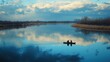 © pimpat - Scenic Kayaking Adventure on Serene River with Reflection and Sky