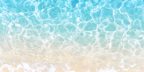 Wall Mural - An aerial view of the sea water gently lapping at the beach.