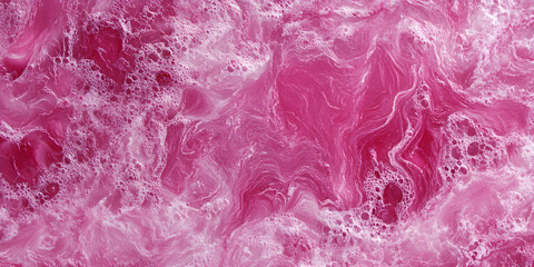 Wall Mural - background of the surface of a pink liquid that moves until it bubbles.