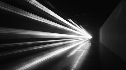 Wall Mural - A tunnel illuminated by beams of light, creating a dramatic perspective.