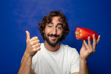 Sticker - young adult bearded man with a red pepper