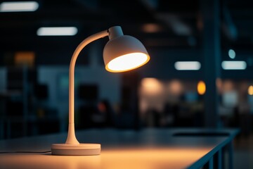 Aufkleber - Close-up of a futuristic desk lamp casts soft light over a sleek table, highlighting modern design elements in a stylish office environment