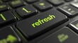 © saychandy - Green refresh title key on a black keyboard, close-up view, symbolizing technology, renewal, and productivity