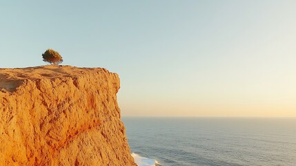 Poster - Serene sunset over a cliff with a lone tree, ocean waves crashing below, peaceful atmosphere