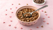 © Anusa - Delicious Cat Food in Bowl with Spoon Surrounded by Snacks