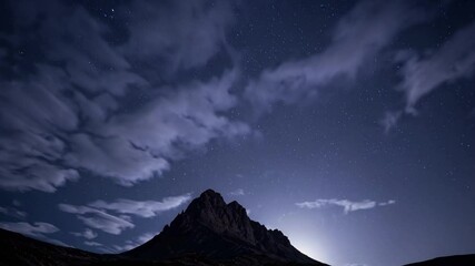 Wall Mural - majestic mountain under night sky | starry sky with moon and clouds | tranquil nocturnal landscape |
