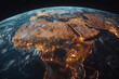 © huntspy - Earth from space at night, showcasing illuminated cities and landscapes across Africa and Europe, highlighting communication networks and urban development