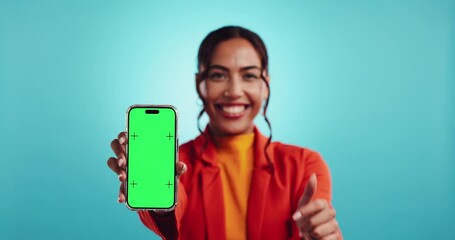 Wall Mural - hand, phone and green screen with point in studio, face and mock up space with ui by blue background