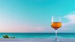 © Konstiantyn Zapylaie - Tranquil beachside sunset with wine glass and scenic ocean view