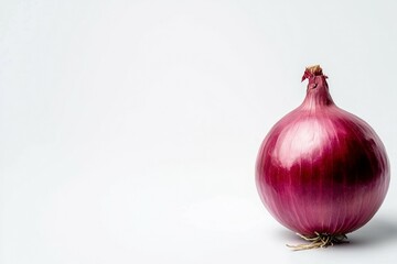 Wall Mural - Large red onion is sitting on a white background