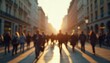 © Vadym - Busy city street scene with large crowd walking. People hurrying. Daytime urban scene. City life dynamic, modern. Casual attire shown. Pedestrians rush to destinations. Sunrise sunset light casts