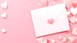 © PHOTOS  STORY - Envelope with blank white paper note inside, surrounded by Valentine hearts on a soft pink background. Romantic love letter concept for Valentine's or Mother's Day.