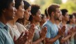 © Vadym - Diverse group of people praying outdoors with closed eyes. Show unity, spirituality. People of different cultures, backgrounds together in prayerful position. Gathering of people for meditation.