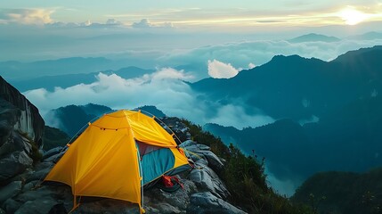 camping tent on the top of the mountain with blue sky background