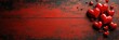 © Watcharaporn - A collection of red hearts arranged on a rustic wooden surface for decoration or romantic themes