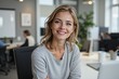 © SR Creative Idea - Confident Smiling Woman in Modern Office Workspace Professional Portrait