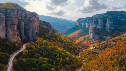 Wall Mural - Winding Mountain Road Featuring Stunning and Vibrant Autumn Colors Throughout the Landscape