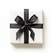 © jiraporn - Minimalist White Gift Box with Sleek Black Ribbon Bow