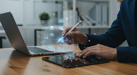 Wall Mural - Data-Driven Decisions: Man Analyzing Interactive Charts on Laptop & Tablet with Stylus for Strategic Business Growth.