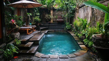 Wall Mural - Pool in a courtyard surrounded by plants, with a chair and umbrella on a patio for a relaxing vacation spot