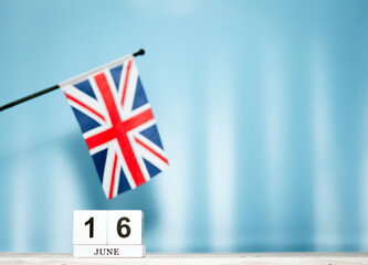 Wall Mural - June Calendar With British Flag With Number  16. Calendar cubes with numbers. Space copy.