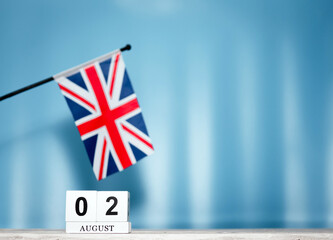 Wall Mural - Calendar August With British Flag With Number 2. Calendar cubes with numbers. Space copy.