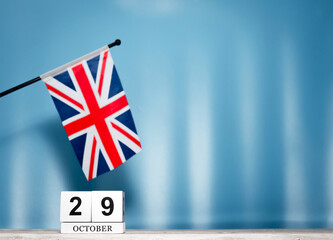 Wall Mural - October Calendar With British Flag With Number  29. Calendar cubes with numbers. Space copy.