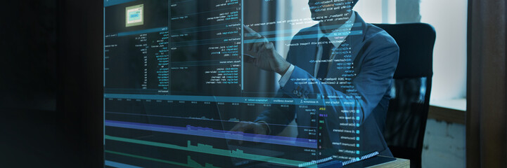 Businessman interacting with virtual code interface. Transparent digital screen displaying fictional programming script, analytics, and network monitoring. Concept of technology and digital innovation