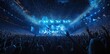 © grigoryepremyan - Crowd cheering at the concert, in front of blue stage lights.