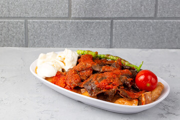 Wall Mural - Traditional delicious Turkish foods; Doner kebab (Iskender)