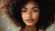 © zhuan - Beauty portrait of african american woman with curly hair smiling on beige background