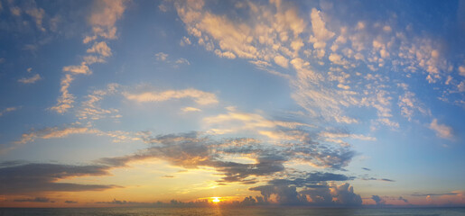 Wall Mural - romantic sunset sky with clouds, panoramic background