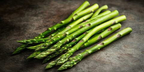 A bunch of fresh green asparagus spears, likely found at a local farmers market or grocery store.