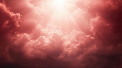 Wall Mural - A stunning view of a pink cloudy sky with rays of sunlight shining through.