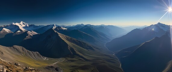 Wall Mural - A breathtaking view capturing sweeping mountain ranges beneath a clear blue sky showcasing the majesty and beauty of the natural world