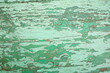 © Serhii - Textured peeling paint on a weathered wooden surface