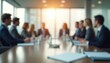 © Maryna - Business people engaged in round table discussion in conference room. Blurred image business partners meeting. Interior setting highlights modern business lifestyle, corporate convention. Focused on