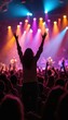 © Maryna - Audience members enjoy lively music at concert. People raise hands up in excitement. Colorful stage lights illuminate performers, crowd. People dance in crowd. Atmosphere electric, happy. Concert