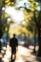 Aufkleber - Abstract silhouette of a person walking through a sunlit tree lined path with bokeh effect : Generative AI