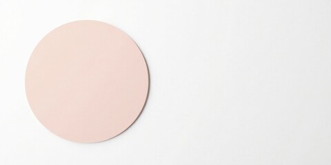 Wall Mural - A Pale Pink Circular Element on a White Background, Ideal for Minimalist Designs and Presentations