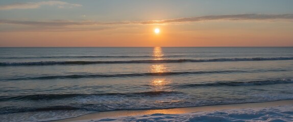 Wall Mural - tranquil winter sunset reflection on calm ocean waves in afternoon glow