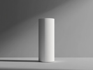 Wall Mural - White cylinder mockup, studio lighting, gray background, product display