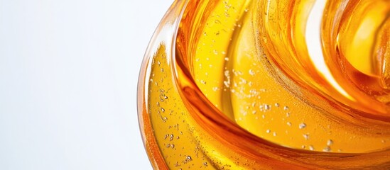 Wall Mural - macro shot of vibrant orange glass featuring fluid swirls with empty space for text on a clean white